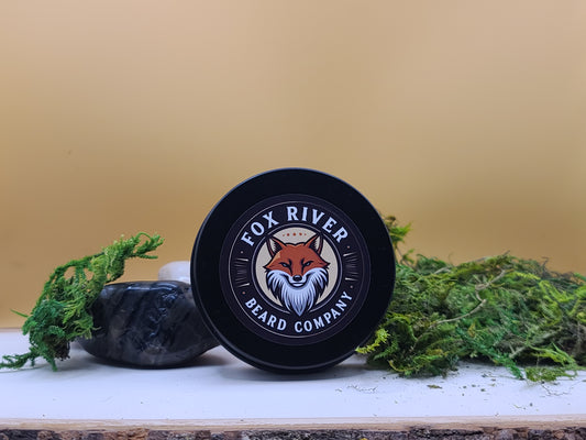 Fox River Beard Company product on a wooden surface with greenery